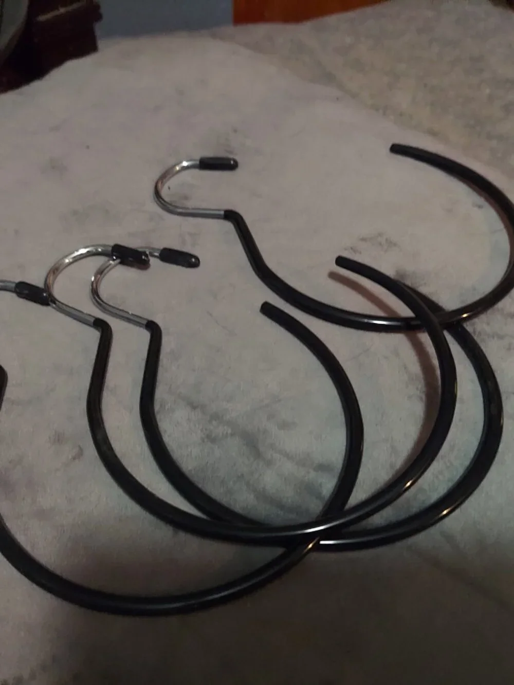 Hangers for belts, scarves, purses